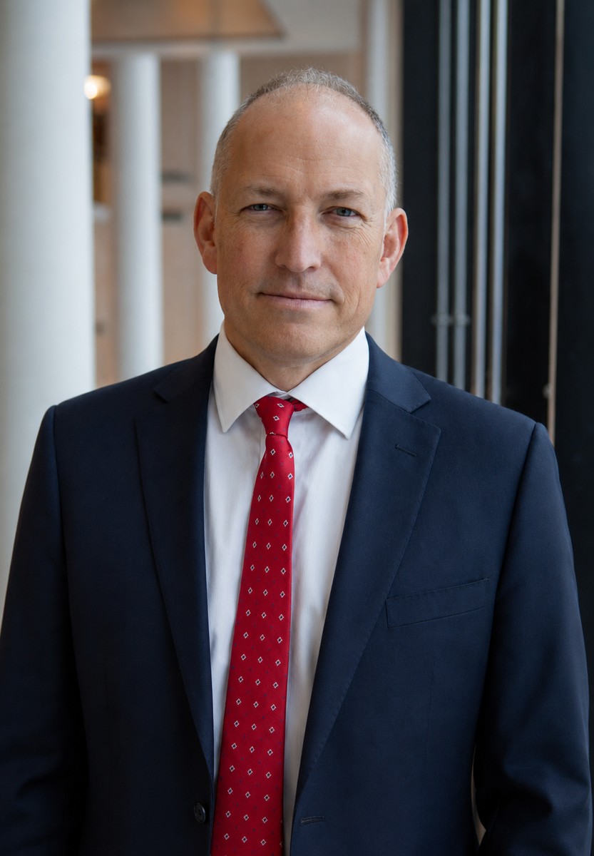 Formal option headshot of Joshua Lawrence